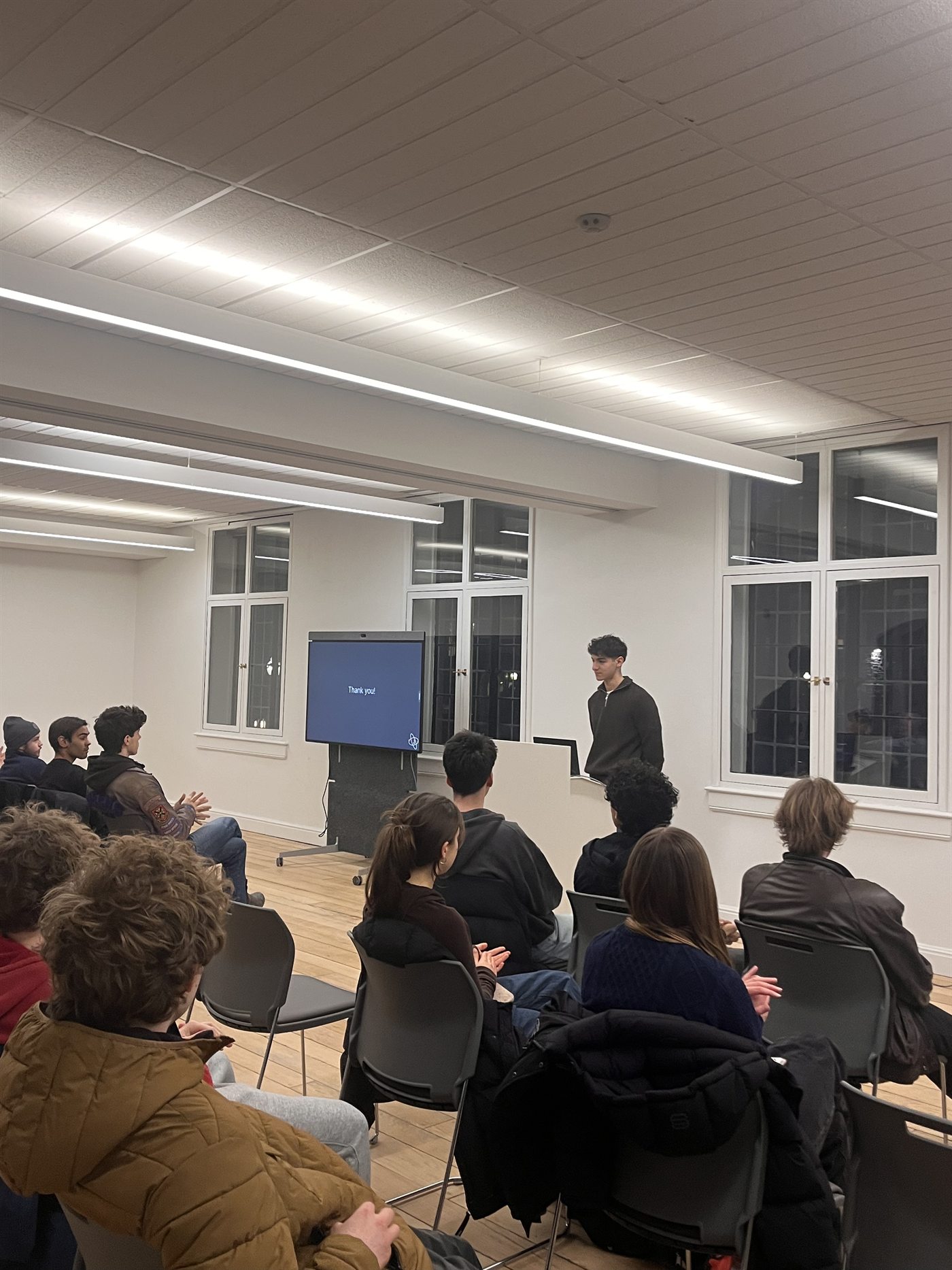 Ryan presenting to a full room at the QNET information night